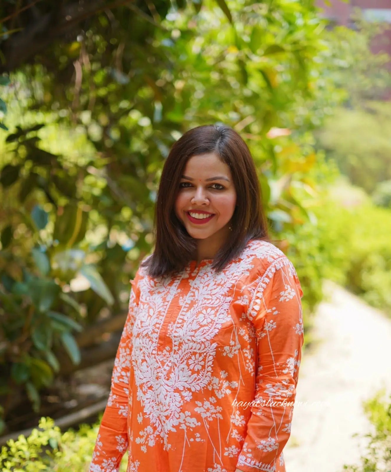 Batool orange mul mul kurta