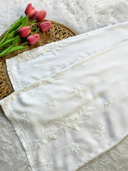 Rayon white palazzo pants with chikankari embroidery by Hayat’s Lucknowi