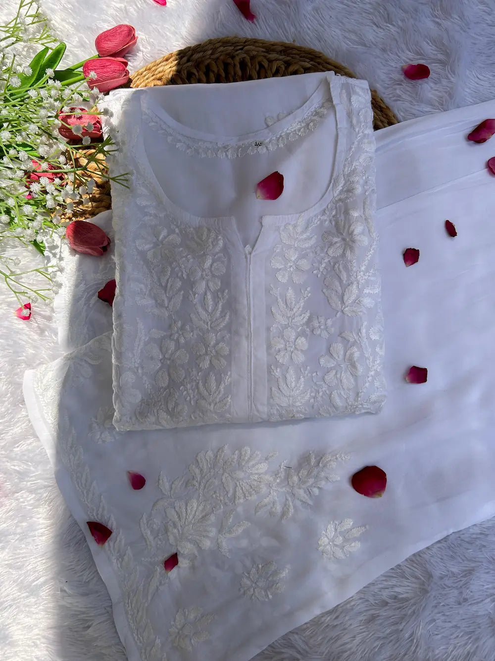 
Khushi white rayon Lucknowi chikankari kurta set featuring delicate hand embroidery and elegant traditional styling for graceful ethnic wear by Hayat's Lucknowi
