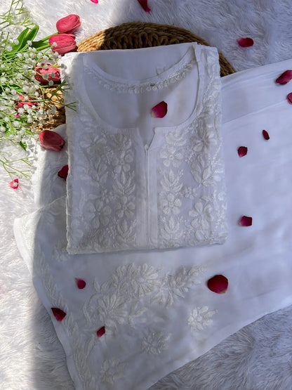 
Khushi white rayon Lucknowi chikankari kurta set featuring delicate hand embroidery and elegant traditional styling for graceful ethnic wear by Hayat's Lucknowi

