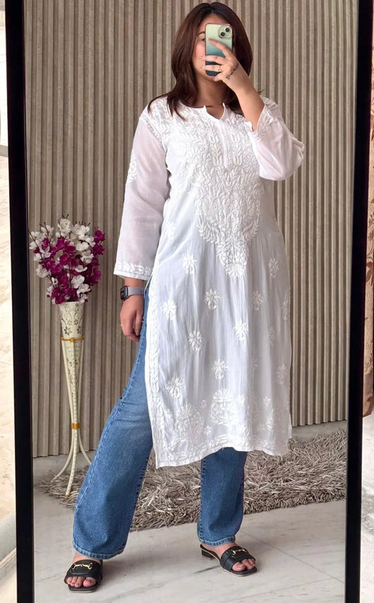 
White modal Lucknowi chikankari kurta adorned with intricate hand embroidery for a classic and elegant ethnic look by Hayat's Lucknowi
