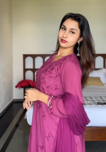 
Wine rayon Lucknowi chikankari kurta set with mukesh work and dupatta crafted for elegant festive wear by Hayat's Lucknowi
