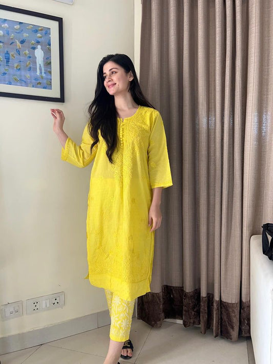 
Yellow dobby cotton kurta pant set featuring textured breathable fabric and simple elegant styling for comfortable everyday ethnic wear by Hayat's Lucknowi.
