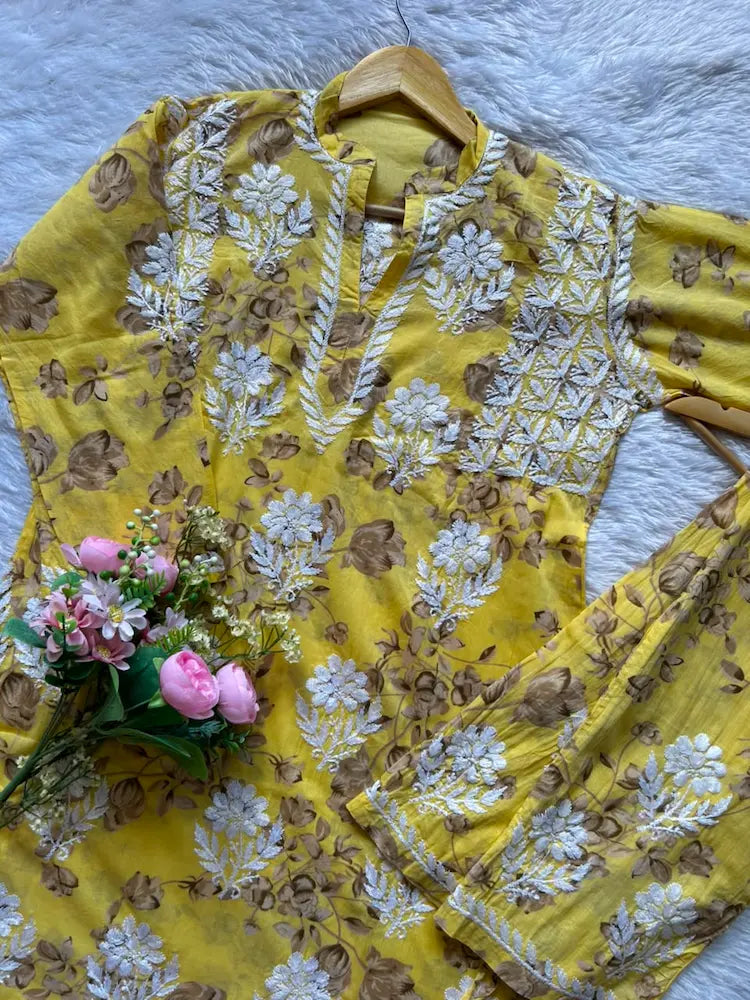 
Sana yellow mul mul Lucknowi chikankari kurta set featuring delicate hand embroidery and soft breathable fabric for bright, elegant everyday and festive ethnic wear by Hayat's Lucknowi.
