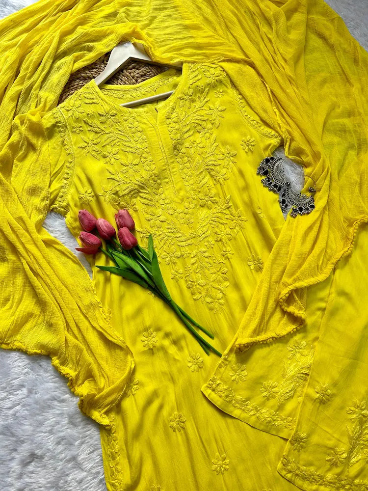 
Zeenat yellow rayon Lucknowi chikankari kurta set with dupatta featuring delicate hand embroidery and elegant traditional craftsmanship for graceful ethnic wear by Hayat's Lucknowi
