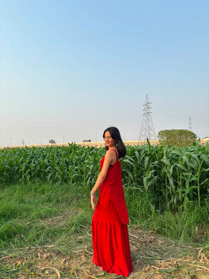 
Zareen red georgette chikankari kurta garara set featuring delicate hand embroidery and flowy lightweight fabric for elegant festive and traditional ethnic wear by Hayat's Lucknowi.
