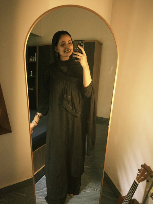 Zeenat black rayon Lucknowi Chikankari kurta set with dupatta featuring intricate handcrafted Chikankari embroidery on soft, flowy rayon fabric for elegant festive, party, and ethnic wear by Hayat's Lucknowi.
