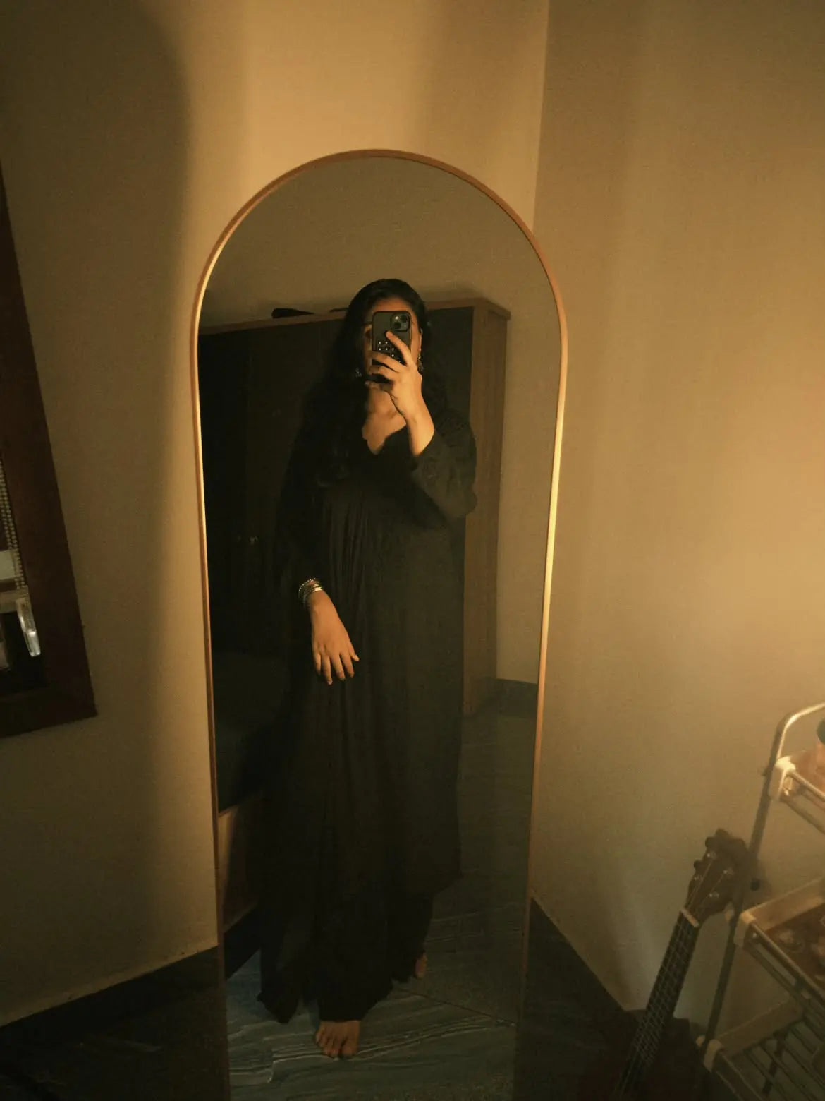 Zeenat black rayon Lucknowi Chikankari kurta set with dupatta featuring intricate handcrafted Chikankari embroidery on soft, flowy rayon fabric for elegant festive, party, and ethnic wear by Hayat's Lucknowi.
