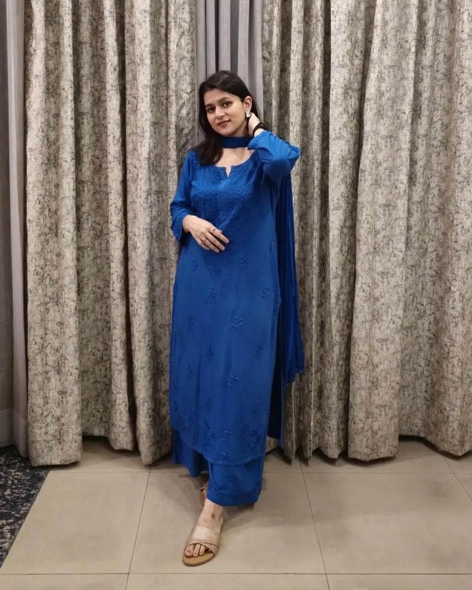 
Zeenat blue rayon Lucknowi chikankari kurta set with dupatta featuring intricate hand embroidery and elegant traditional craftsmanship for timeless festive and ethnic wear by Hayat's Lucknowi.

