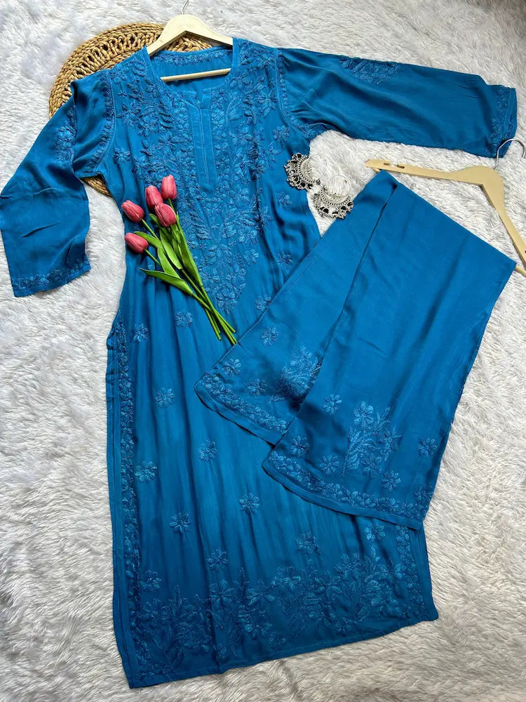 
Zeenat blue rayon Lucknowi chikankari kurta set with dupatta featuring intricate hand embroidery and elegant traditional craftsmanship for timeless festive and ethnic wear by Hayat's Lucknowi.
