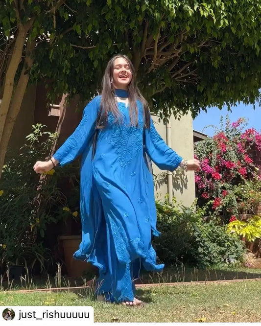 
Zeenat blue rayon Lucknowi chikankari kurta set with dupatta featuring intricate hand embroidery and elegant traditional craftsmanship for timeless festive and ethnic wear by Hayat's Lucknowi.
