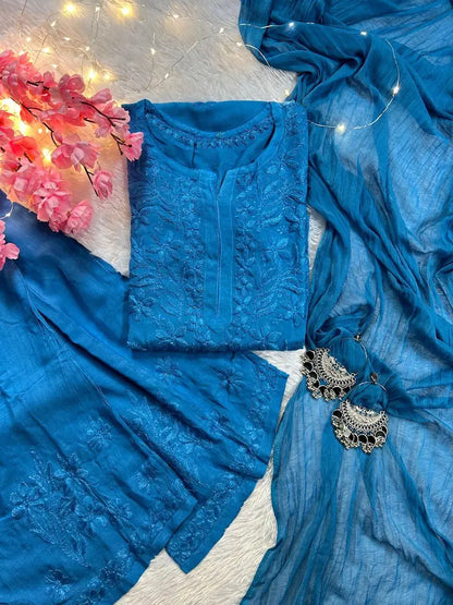 
Zeenat blue rayon Lucknowi chikankari kurta set with dupatta featuring intricate hand embroidery and elegant traditional craftsmanship for timeless festive and ethnic wear by Hayat's Lucknowi.
