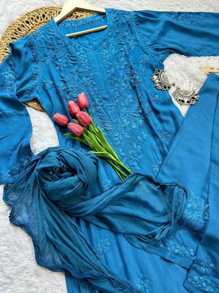 
Zeenat blue rayon Lucknowi chikankari kurta set with dupatta featuring intricate hand embroidery and elegant traditional craftsmanship for timeless festive and ethnic wear by Hayat's Lucknowi.
