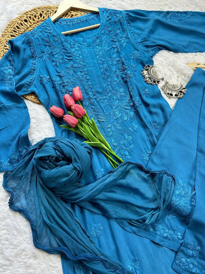 
Zeenat blue rayon Lucknowi chikankari kurta set with dupatta featuring intricate hand embroidery and elegant traditional craftsmanship for timeless festive and ethnic wear by Hayat's Lucknowi.
