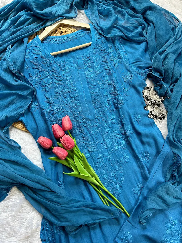 
Zeenat blue rayon Lucknowi chikankari kurta set with dupatta featuring intricate hand embroidery and elegant traditional craftsmanship for timeless festive and ethnic wear by Hayat's Lucknowi.
