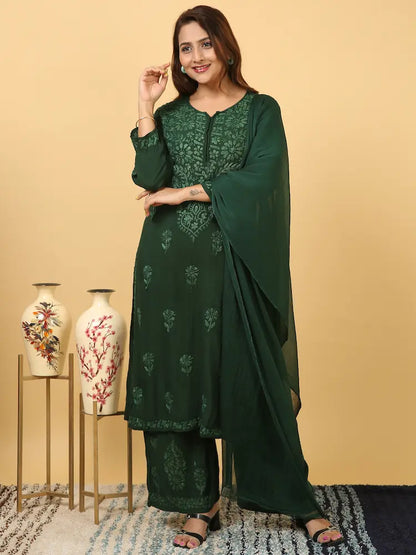 
Zeenat bottle green rayon Lucknowi chikankari kurta set with dupatta featuring intricate hand embroidery for a graceful and elegant ethnic ensemble by Hayat's Lucknowi
