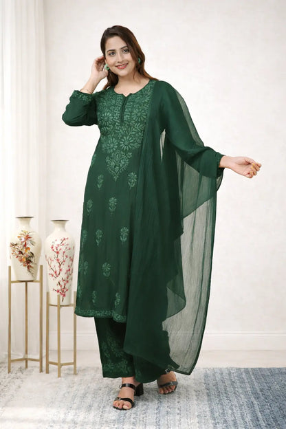 
Zeenat bottle green rayon Lucknowi chikankari kurta set with dupatta featuring intricate hand embroidery for a graceful and elegant ethnic ensemble by Hayat's Lucknowi
