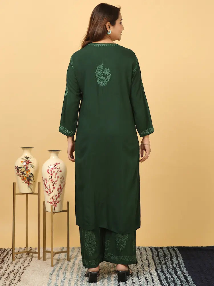 
Zeenat bottle green rayon Lucknowi chikankari kurta set with dupatta featuring intricate hand embroidery for a graceful and elegant ethnic ensemble by Hayat's Lucknowi
