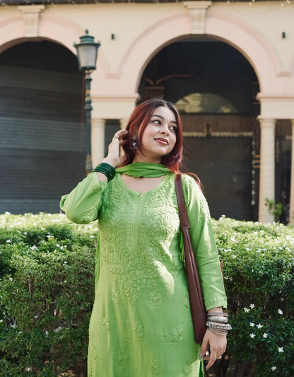 
Zeenat henna green rayon Lucknowi chikankari kurta set with dupatta featuring intricate hand embroidery for elegant ethnic wear by Hayat's Lucknowi