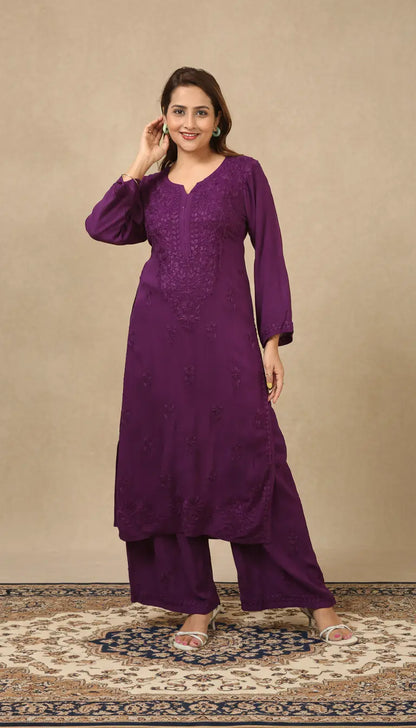 
Zeenat purple rayon Lucknowi chikankari kurta set with dupatta featuring intricate hand embroidery and elegant traditional craftsmanship for sophisticated ethnic wear by Hayat's Lucknowi
