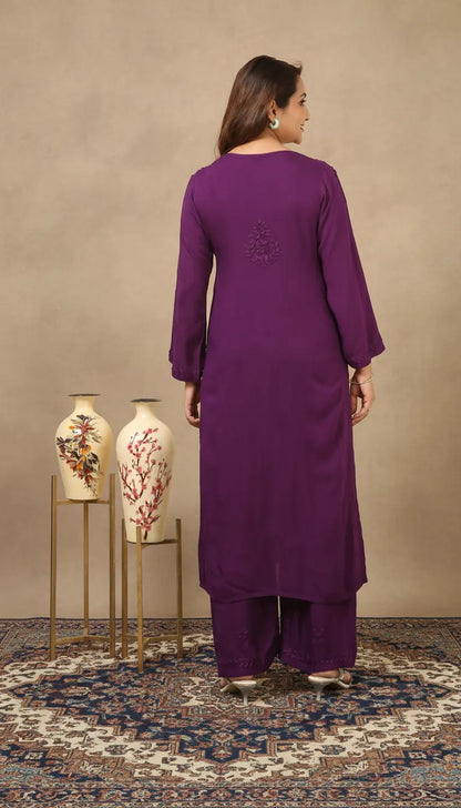 
Zeenat purple rayon Lucknowi chikankari kurta set with dupatta featuring intricate hand embroidery and elegant traditional craftsmanship for sophisticated ethnic wear by Hayat's Lucknowi
