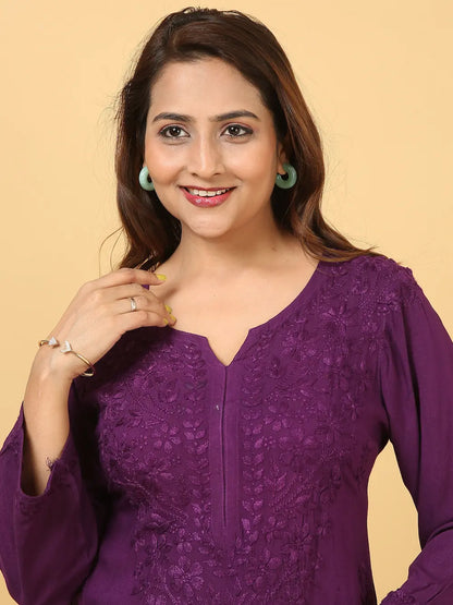 
Zeenat purple rayon Lucknowi chikankari kurta set with dupatta featuring intricate hand embroidery and elegant traditional craftsmanship for sophisticated ethnic wear by Hayat's Lucknowi
