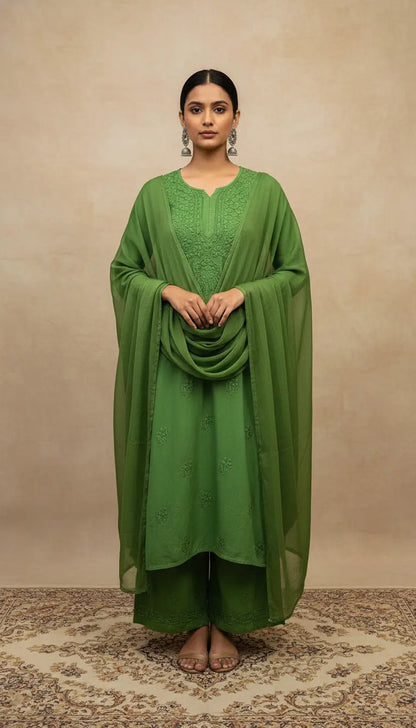 
Sabz green rayon chikankari kurta set with dupatta featuring handcrafted Lucknowi embroidery by Hayat's Lucknowi
