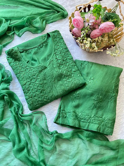 
Sabz green rayon chikankari kurta set with dupatta featuring handcrafted Lucknowi embroidery by Hayat's Lucknowi
