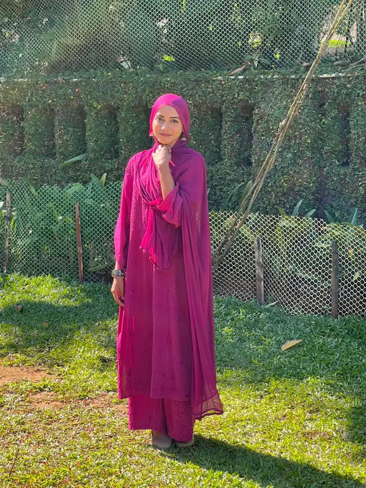 
Zeenat wine rayon Lucknowi chikankari kurta set with dupatta featuring intricate hand embroidery and elegant traditional craftsmanship for rich festive and ethnic wear by Hayat's Lucknowi.
