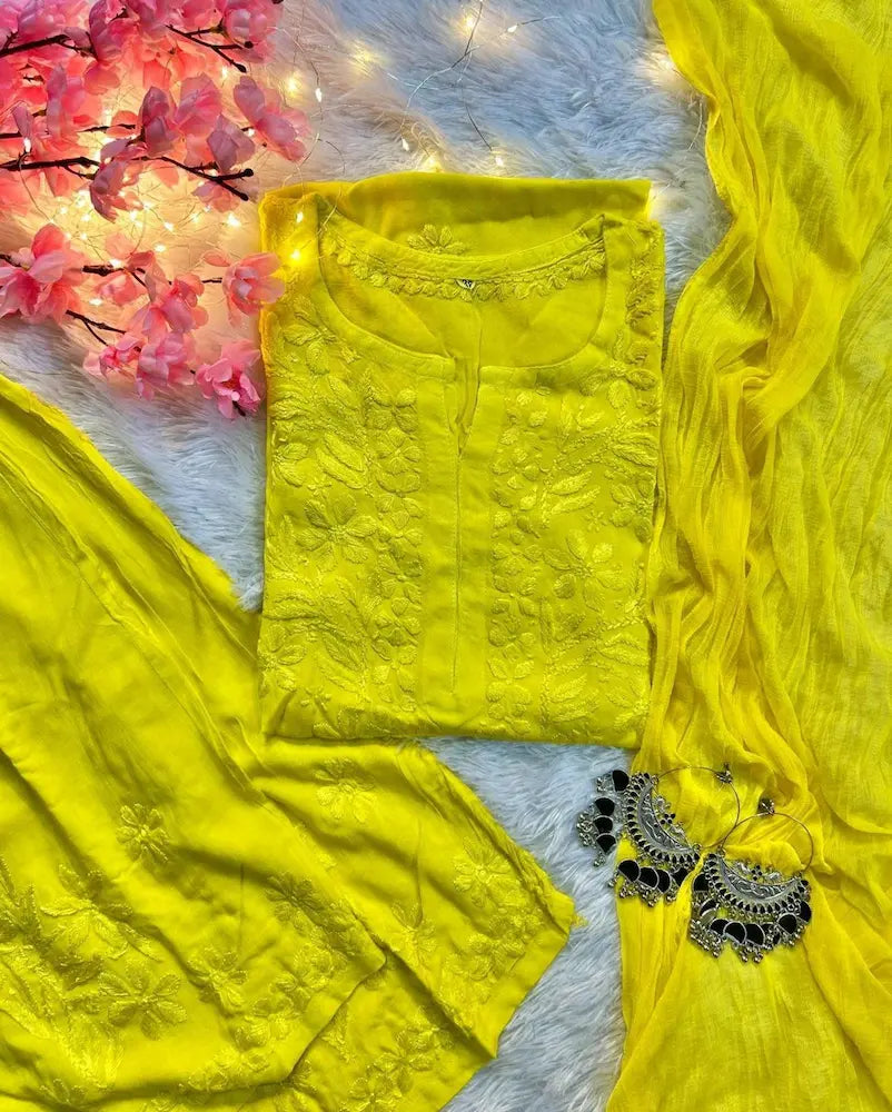 
Zeenat yellow rayon Lucknowi chikankari kurta set with dupatta featuring delicate hand embroidery and elegant traditional craftsmanship for graceful ethnic wear by Hayat's Lucknowi
