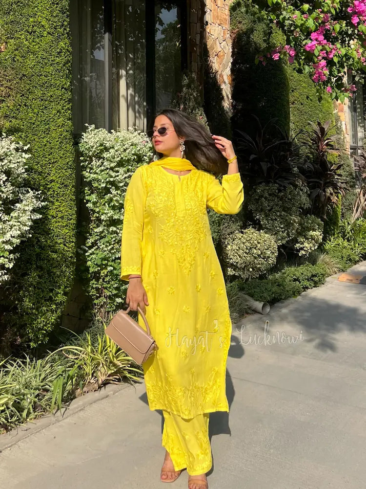 
Zeenat yellow rayon Lucknowi chikankari kurta set with dupatta featuring delicate hand embroidery and elegant traditional craftsmanship for graceful ethnic wear by Hayat's Lucknowi
