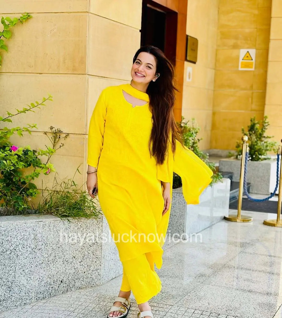 
Zeenat yellow rayon Lucknowi chikankari kurta set with dupatta featuring delicate hand embroidery and elegant traditional craftsmanship for graceful ethnic wear by Hayat's Lucknowi
