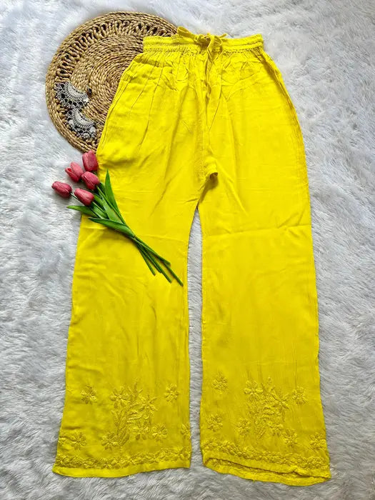 
Zeenat yellow rayon Lucknowi chikankari kurta set with dupatta featuring delicate hand embroidery and elegant traditional craftsmanship for graceful ethnic wear by Hayat's Lucknowi
