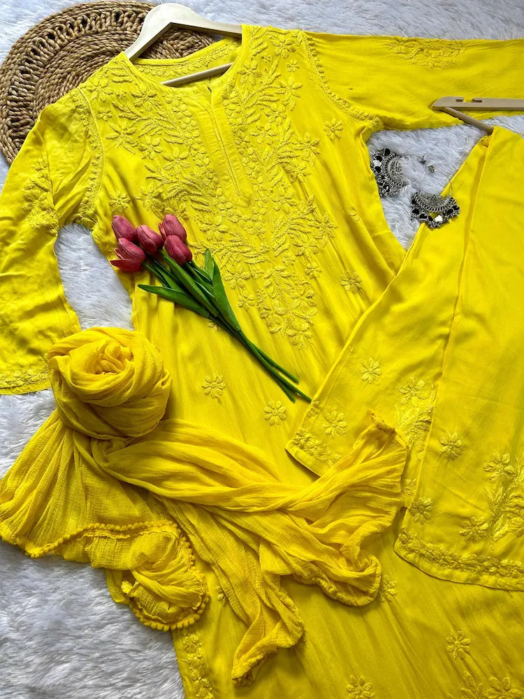 
Zeenat yellow rayon Lucknowi chikankari kurta set with dupatta featuring delicate hand embroidery and elegant traditional craftsmanship for graceful ethnic wear by Hayat's Lucknowi
