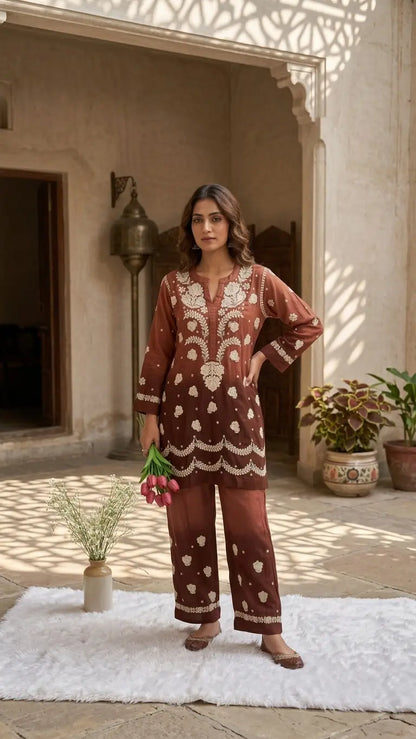 
Zehra brown premium modal chikankari kurta set featuring intricate hand embroidery and elegant traditional craftsmanship for sophisticated festive and ethnic wear by Hayat's Lucknowi.
