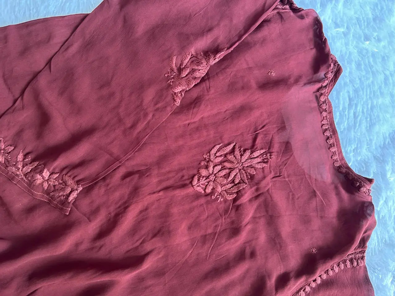 Zoya Brown Georgette Chikankari Kurta Set with Dupatta featuring intricate hand embroidery on lightweight georgette fabric for an elegant festive and ethnic look by Hayat’s Lucknowi.
