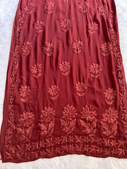Zoya Brown Georgette Chikankari Kurta Set with Dupatta featuring intricate hand embroidery on lightweight georgette fabric for an elegant festive and ethnic look by Hayat’s Lucknowi.
