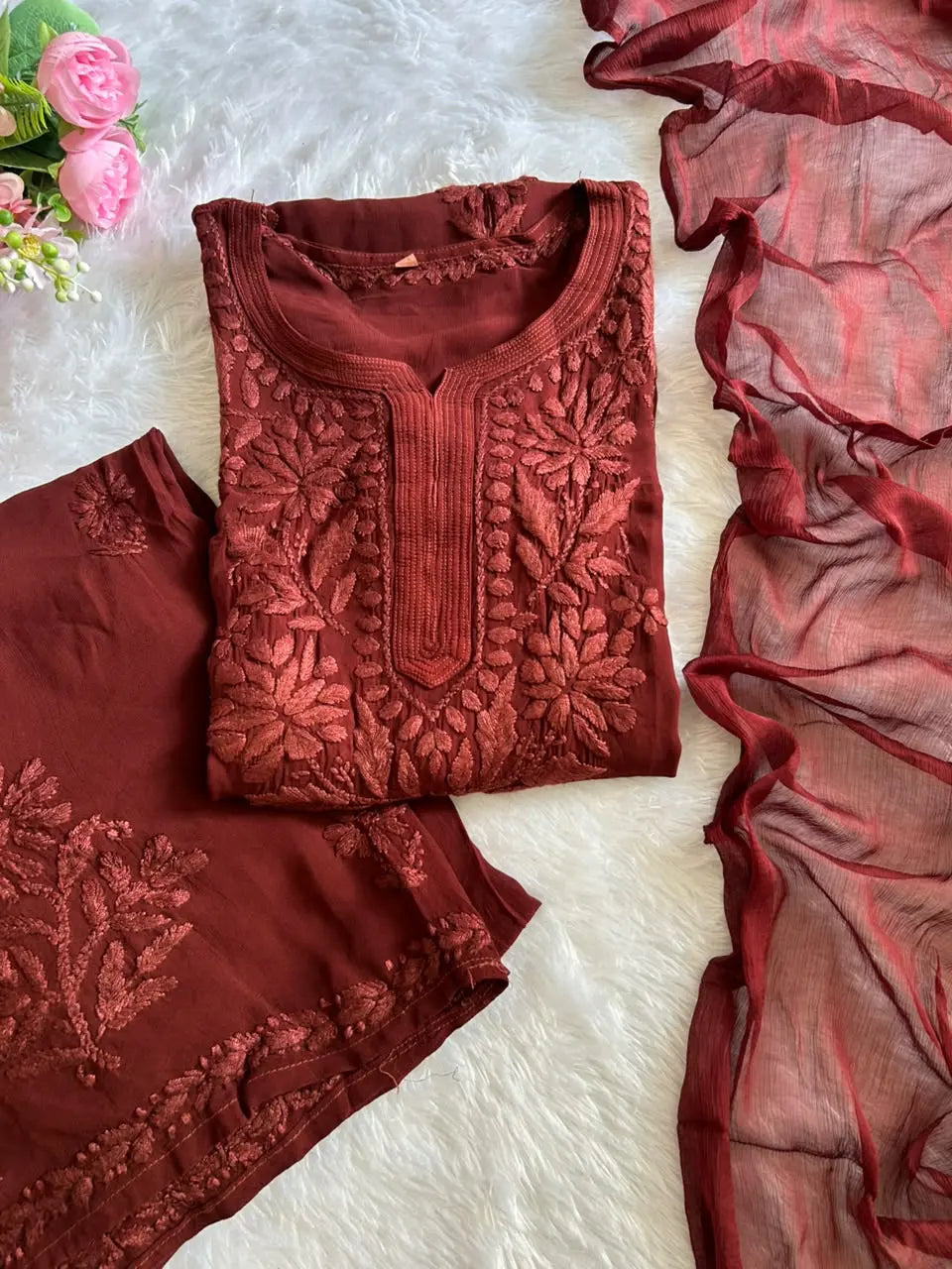 Zoya Brown Georgette Chikankari Kurta Set with Dupatta featuring intricate hand embroidery on lightweight georgette fabric for an elegant festive and ethnic look by Hayat’s Lucknowi.
