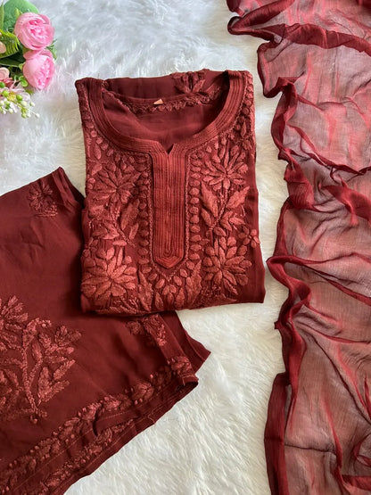 Zoya Brown Georgette Chikankari Kurta Set with Dupatta featuring intricate hand embroidery on lightweight georgette fabric for an elegant festive and ethnic look by Hayat’s Lucknowi.
