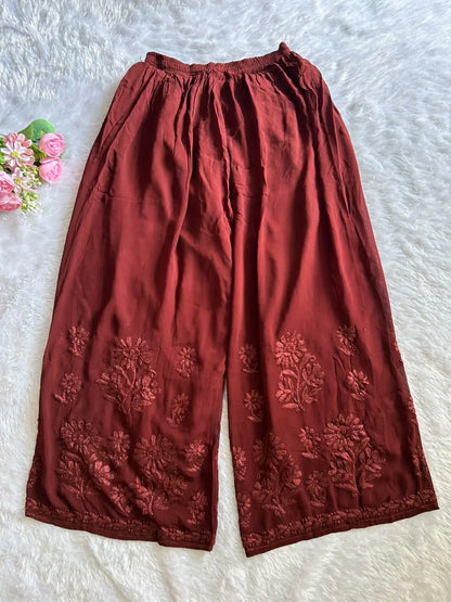 Zoya Brown Georgette Chikankari Kurta Set with Dupatta featuring intricate hand embroidery on lightweight georgette fabric for an elegant festive and ethnic look by Hayat’s Lucknowi.
