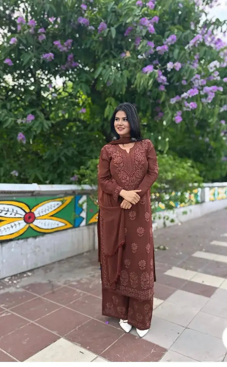 
Graceful georgette chikankari suit set featuring intricate hand embroidery for festive wear by Hayat's Lucknowi

