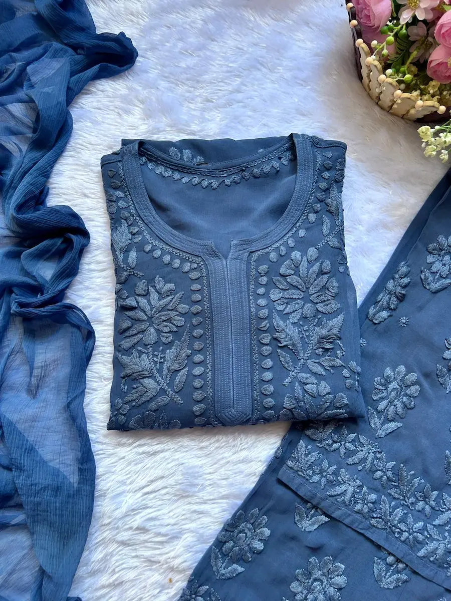 
Zoya denim blue georgette chikankari kurta set with dupatta featuring elegant hand embroidery for graceful and stylish ethnic wear by Hayat's Lucknowi
