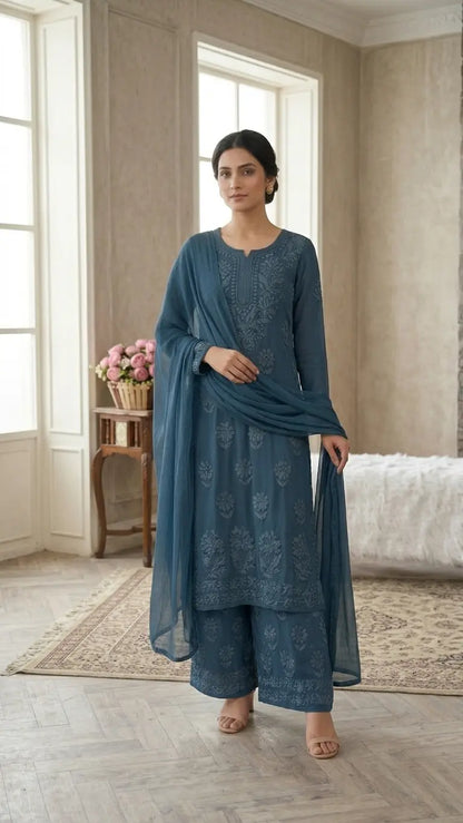 
Zoya denim blue georgette chikankari kurta set with dupatta featuring elegant hand embroidery for graceful and stylish ethnic wear by Hayat's Lucknowi