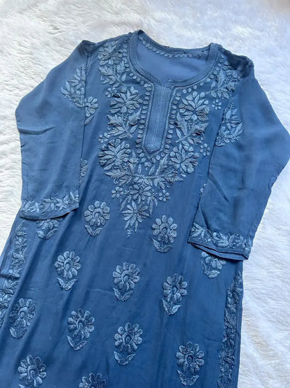 
Zoya denim blue georgette chikankari kurta set with dupatta featuring elegant hand embroidery for graceful and stylish ethnic wear by Hayat's Lucknowi