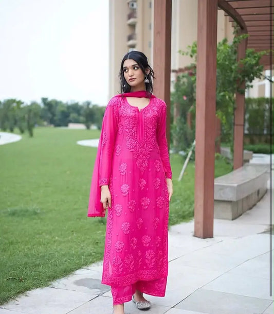 

Zoya magenta pink georgette Lucknowi Chikankari kurta set with dupatta featuring exquisite handcrafted Chikankari embroidery on lightweight flowy georgette fabric for festive, party, and elegant ethnic wear by Hayat's Lucknowi.
