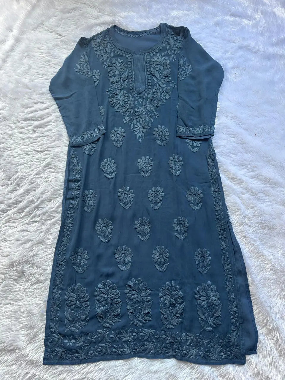 
Zoya denim blue georgette chikankari kurta set with dupatta featuring elegant hand embroidery for graceful and stylish ethnic wear by Hayat's Lucknowi
