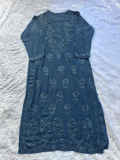 
Zoya denim blue georgette chikankari kurta set with dupatta featuring elegant hand embroidery for graceful and stylish ethnic wear by Hayat's Lucknowi