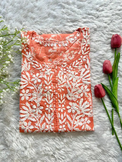 orange mul mul chikankari kurti with intricate hand embroidery