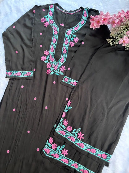 a black kurta set with floral hand embroidered best for work wear and everyday