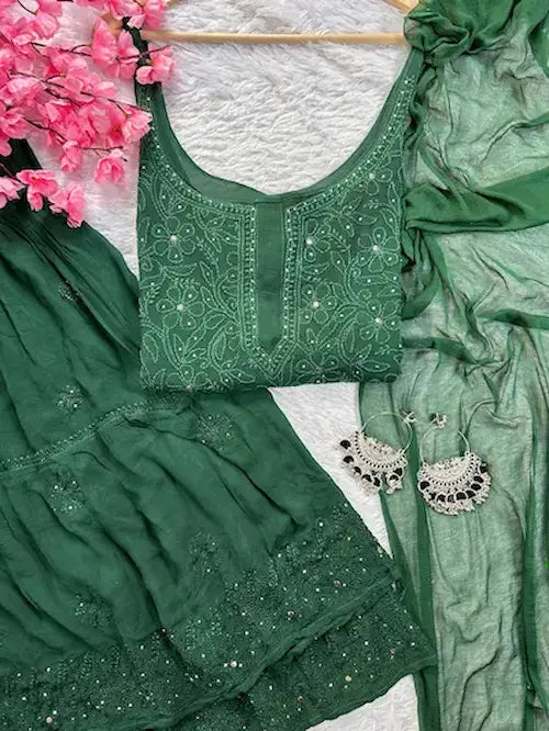 Bottle green georgette gharara set with chikankari and mukesh embroidery by Hayat’s Lucknowi